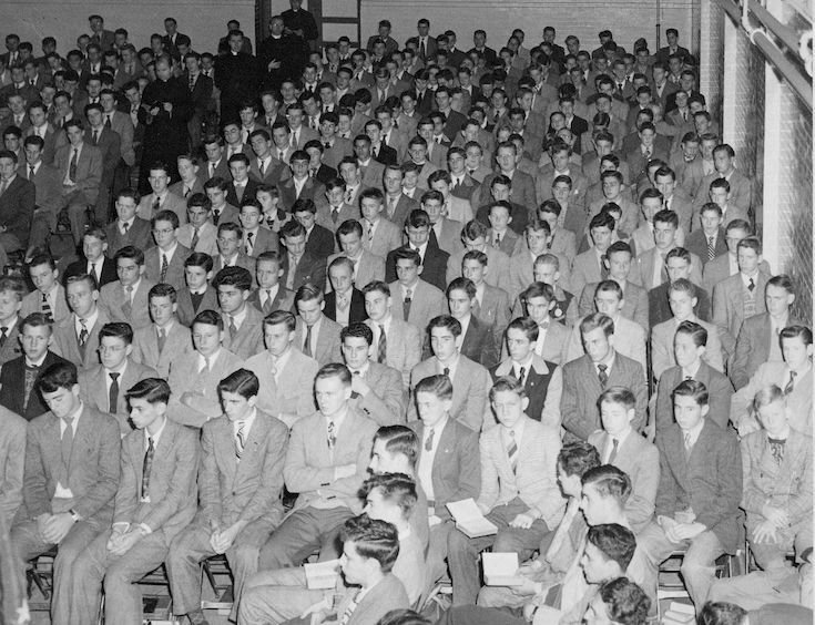 Students preparing for Mass - 8th and West - Gym